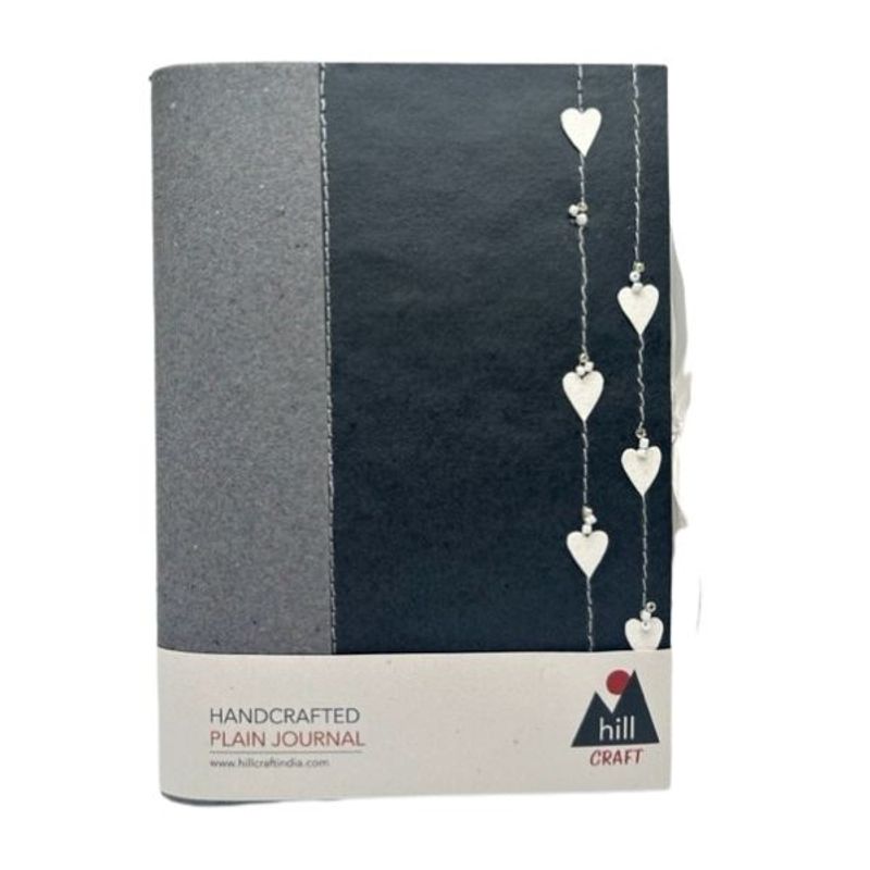 Journal med små papirhjerter